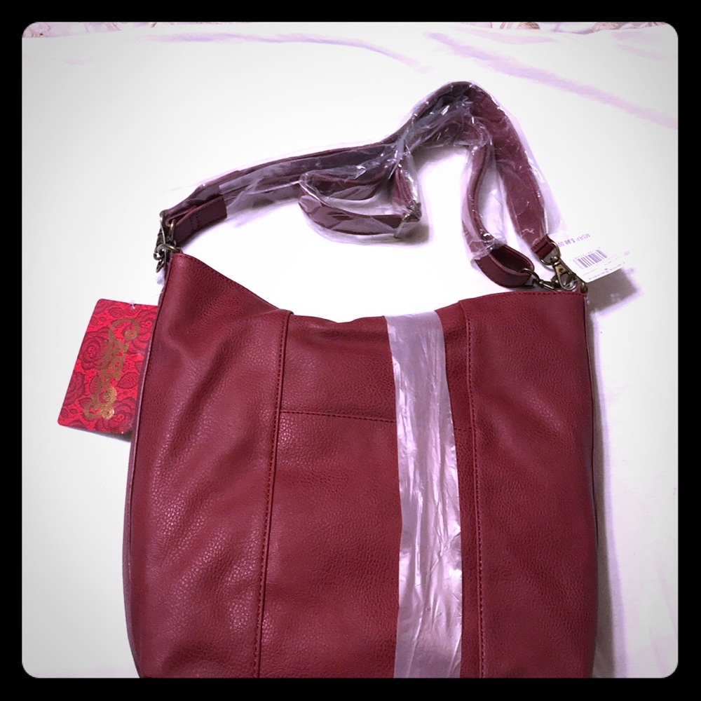 Carlos Santana Purse